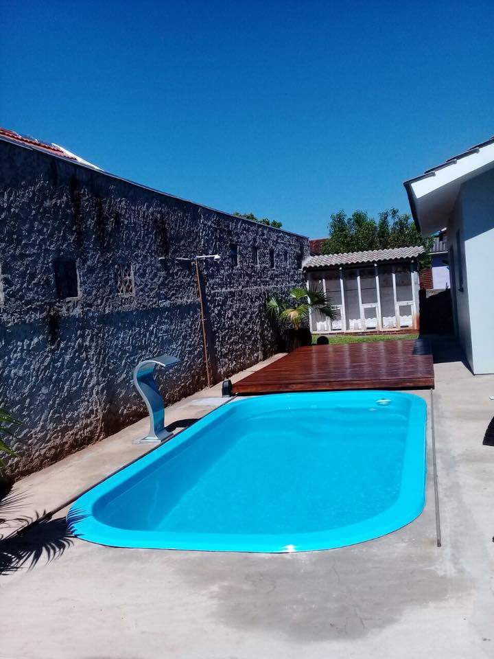 Instalação piscina, deck móvel e cascata